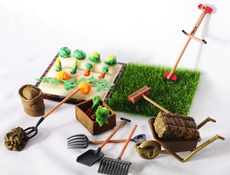 Outdoor Planting Scene Of Mini Farm Shovel And Harrow - Image 6